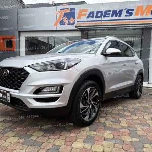 todo-terreno-suv-hyundai-tucson-tl-2.0-tm-6-velocidades-manual-full-ac-mandos-de-audio-al-volante-4x2-2021-plateado-cuero-3-modos-de-manejo-boton-encendido-aros-r19-aleron-antena-tiburon-parrilla-control-descenso-estabilidad-asistente-arranque-en-pendiente-faros-led-halogenos-pantalla-camara-retro-android-aut0-carplay