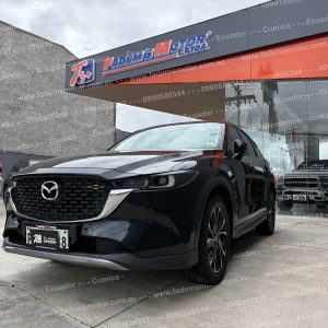 suv-todo-terreno-gasolina-mazda-cx-5-cx5-active-2.0-4x2-ta-automatico-negro-2023-full-cuero-alcantara-pantallas-entretenimiento-en-cabeceras-asientos-electricos-pantalla-camara-de-retro-sensores-de-parqueo-mandos-de-audio-al-volante-paletas-de-cambios-al-volante-android-auto-carplay-velocidad-crucero-faros-led-aros-deportivos-mazda-retrovisores-electricos-abatibles-skyactive-g-aleron-control-de-estabilidad-freno-de-mano-electronico-auto-hold-modos-de-manejo-aire-acondicionado-bizona-boton-de-encendido-2-llaves-doble-caja-caja-skyactive-at-tiptronic