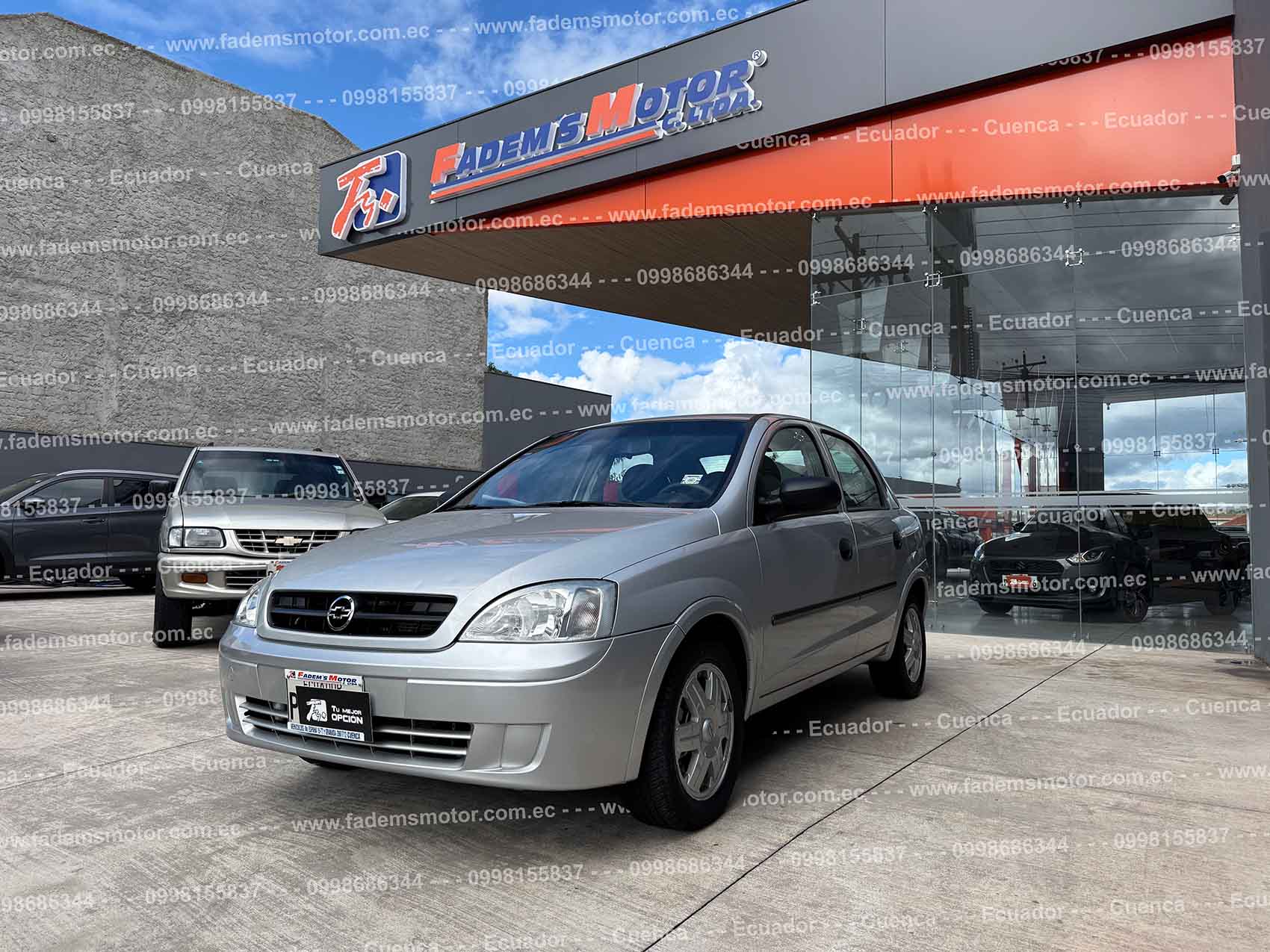 auto-gasolina-sedan-chevrolet-corsa-evolution-1.8-gls-plateado-2004-poco-kilometraje-unico-dueno-compuerta-electrica-4-vidrios-electricos-aire-acondicionado-bloqueo-central-alarma-chevy-2-llaves-5-puertas-tm-manual-impecable-flamante