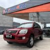suv-todo-terreno-kia-sportage-lx-active-full-gsl-gasolina-4x2-2.0-2008-rojo-tm-manual-aire-acondicionado-halogenos-neblineros-parrilla-aros-deportivos-kia-ventana-posterior-aperturable-vidrios-traseros-tintutados-4-vidrios-y-retrovisores-electricos-abs-alarma-bloqueo-central-2llaves-impecable-frenos-de-disco-delanteros-flamante